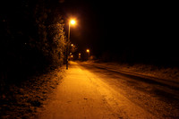 Faringdon street, lit by street lights on a cold winter's evening